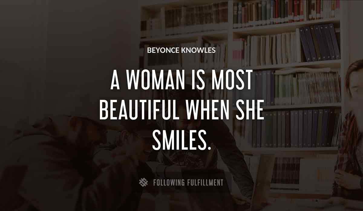 a woman is most beautiful when she smiles Beyonce Knowles quote